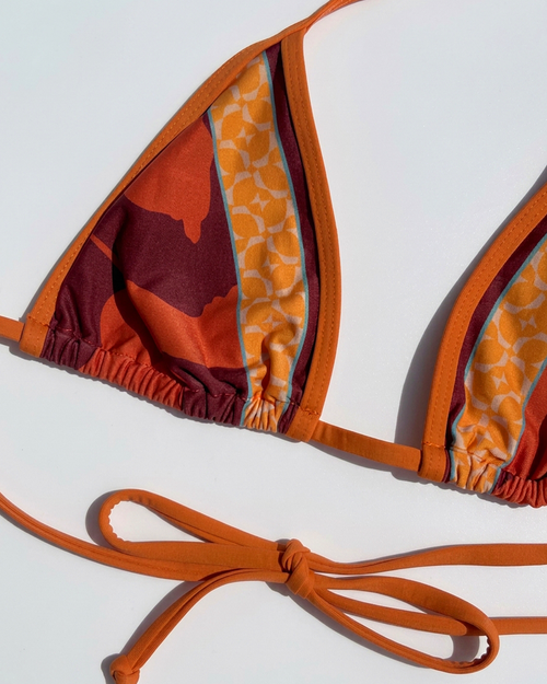 Close up flat lay of the Aspen bikini Top in Cocobolo.