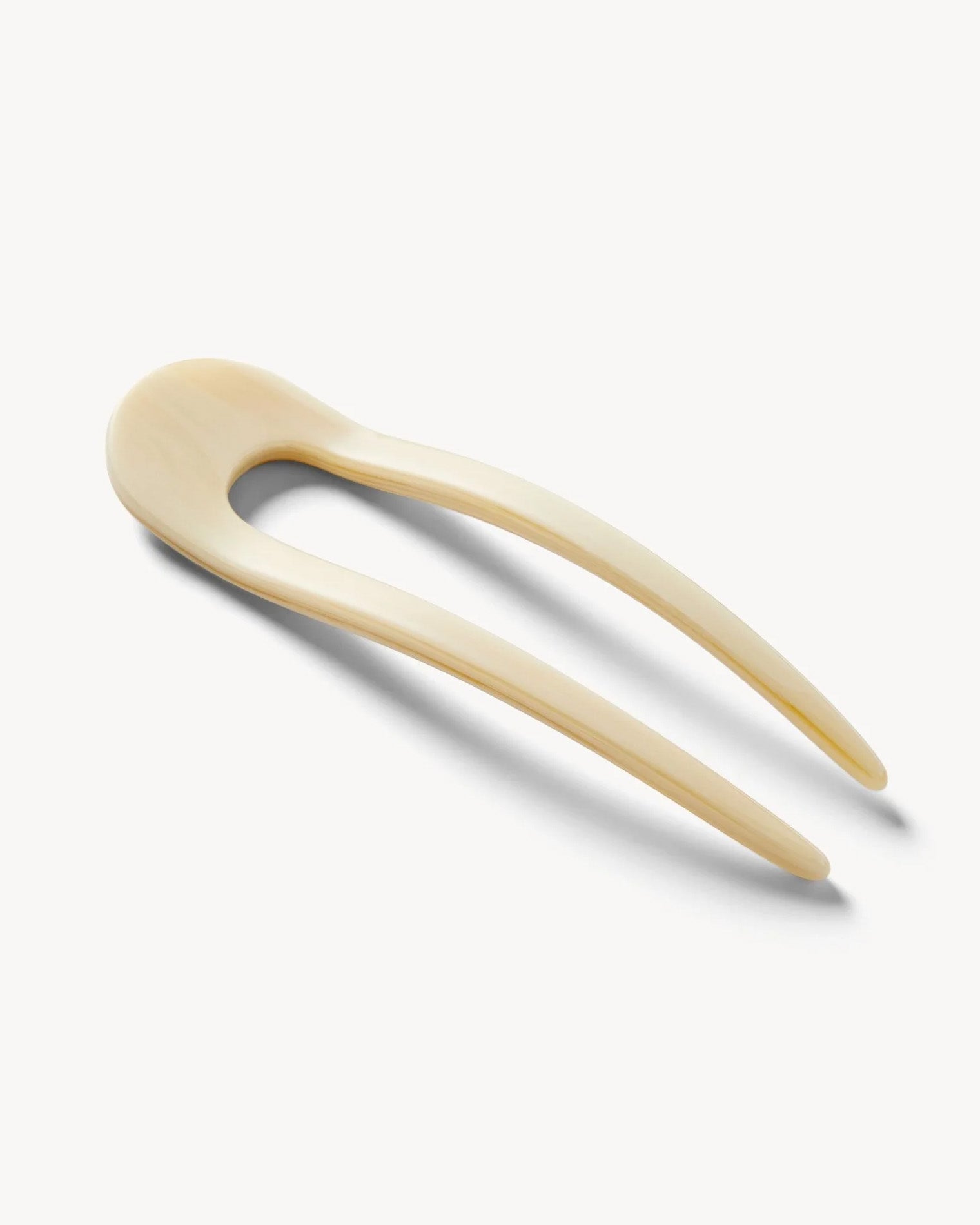 Machete French Hair Pin - White Angled view of the white Machete French Hair Pin showing the resin finish.