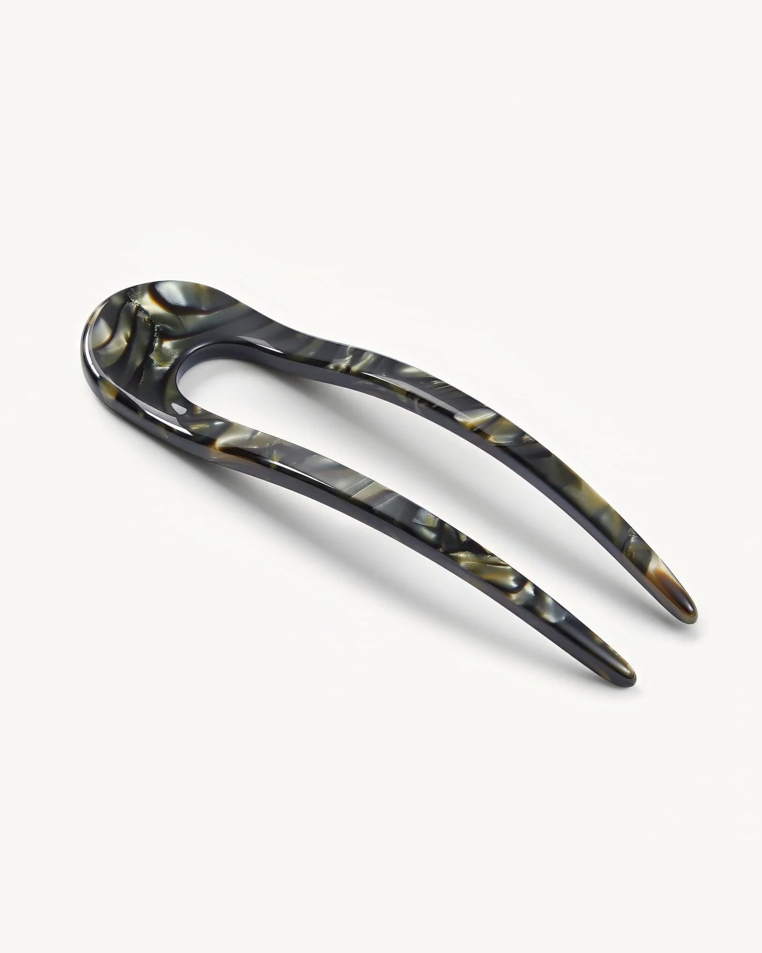 Machete French Hair Pin - Midnight Horn Angled view of the midnight horn Machete French Hair Pin showing the resin finish.