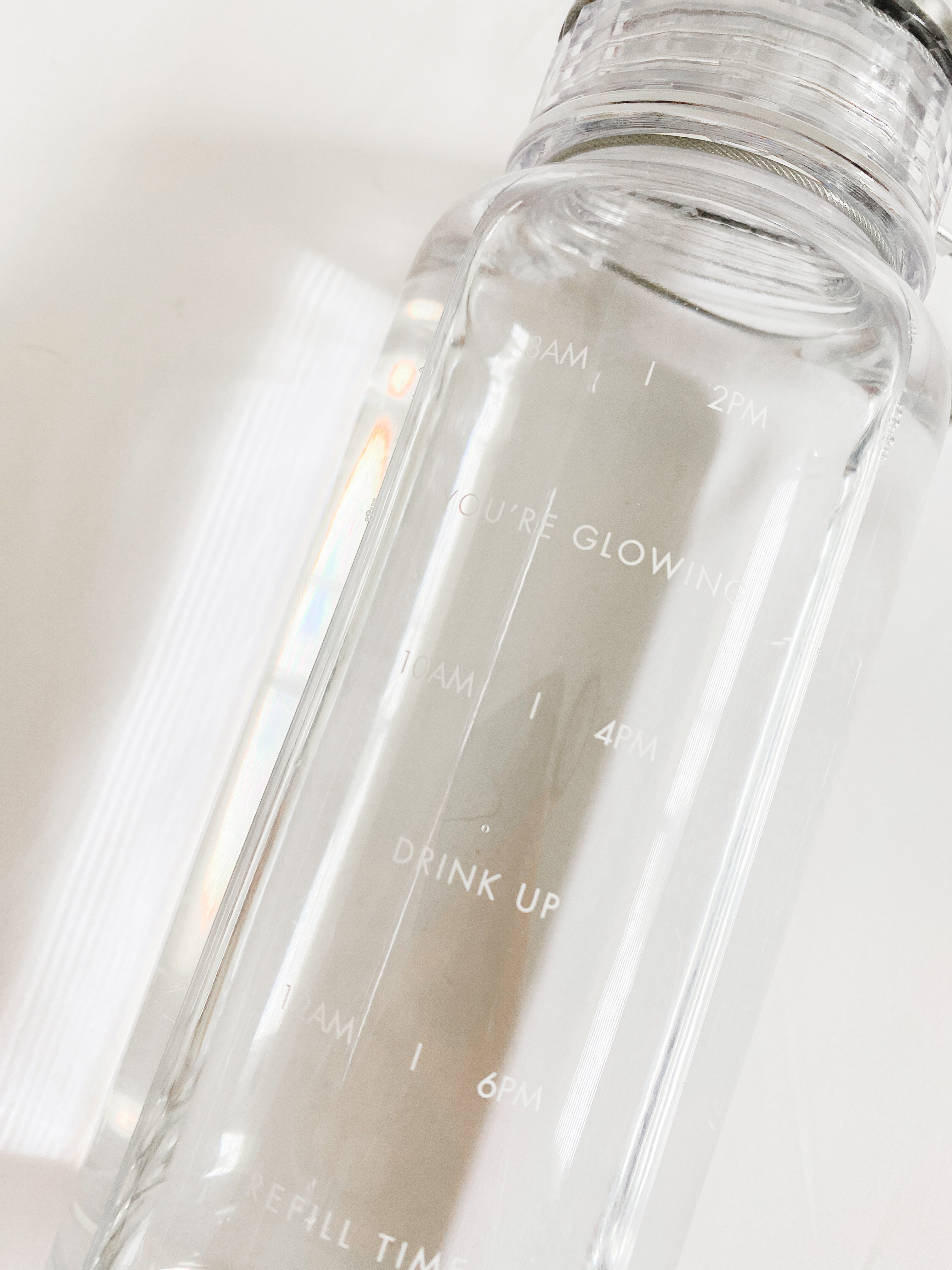 LSPACE water bottle, close-up detail view of etched design, off-model.