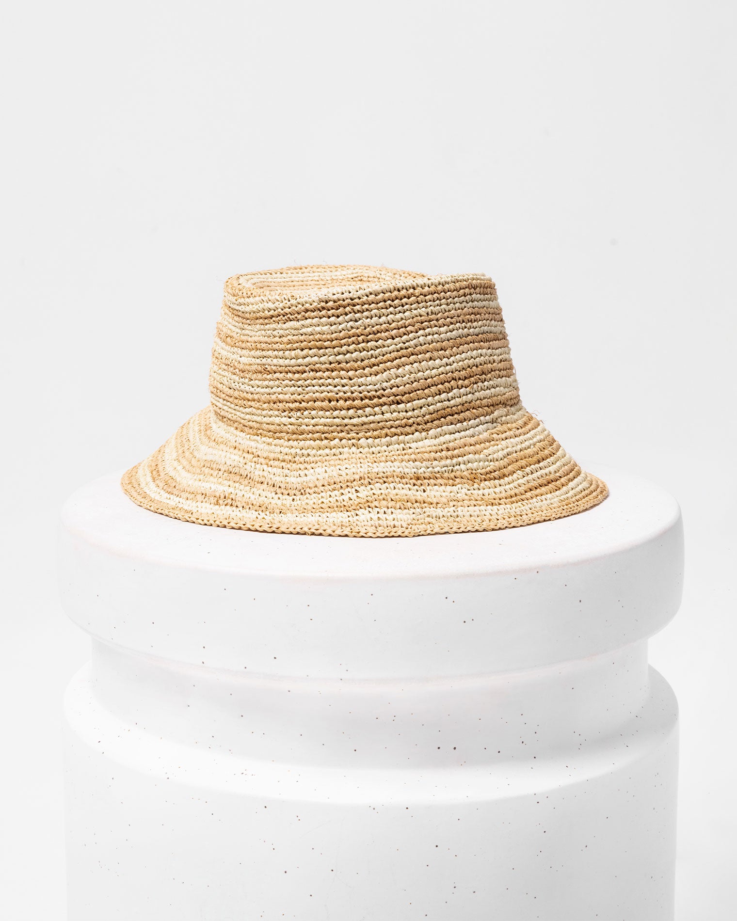 Isadora Bucket Hat - Stripe Off-model image of the Isadora Bucket Hat in stripe on a white pedestal.