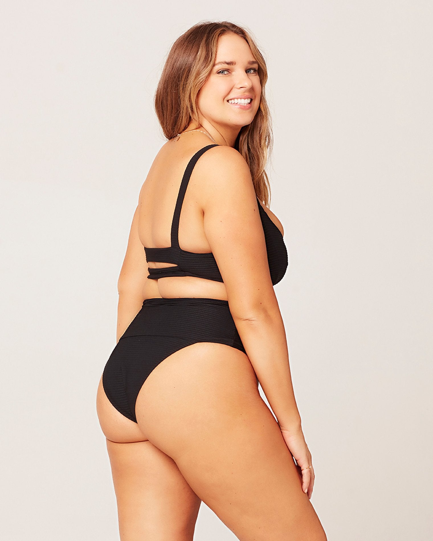 Eco Chic Repreve® Desi Bikini Bottom Black | Model: Ali (size: XL)